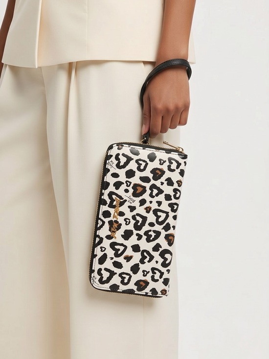 Betsey Johnson Handbags - Betsey Johnson Pink and Black Heart Leopard Zip Wristlet
